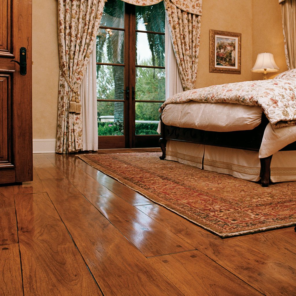 Traditional Bedroom with Hardwood Flooring